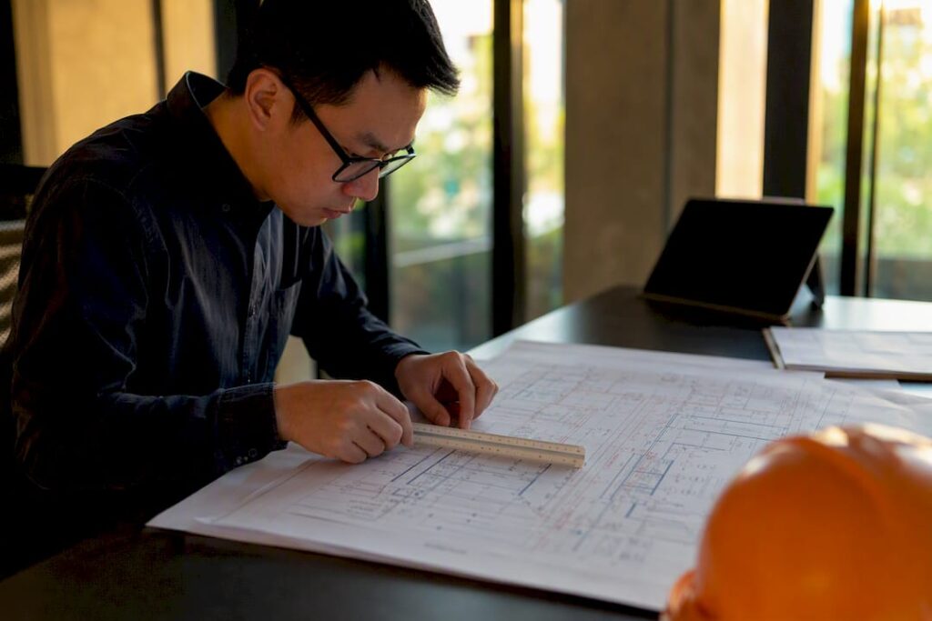 Engineer reviewing fire safety plans