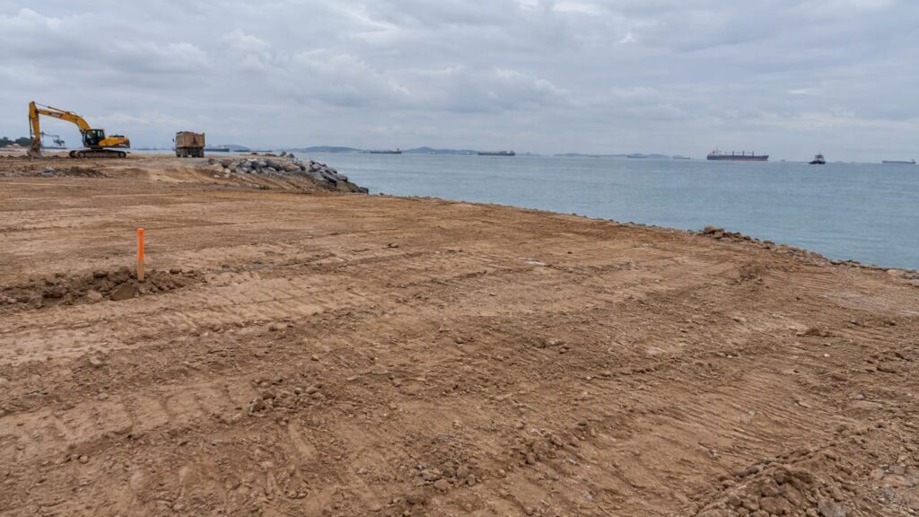 Raised reclaimed platform beside Singapore coastline